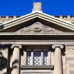 Image of the relief of an open set above the main entrance of the Memorial Park Library